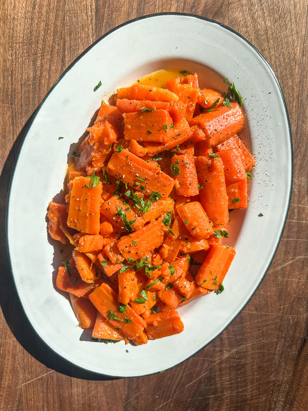 Julia Child’s Butter-Braised Carrots – A Simple, Classic Side Dish That Melts in Your Mouth. Find the recipe on Shutterbean.com 