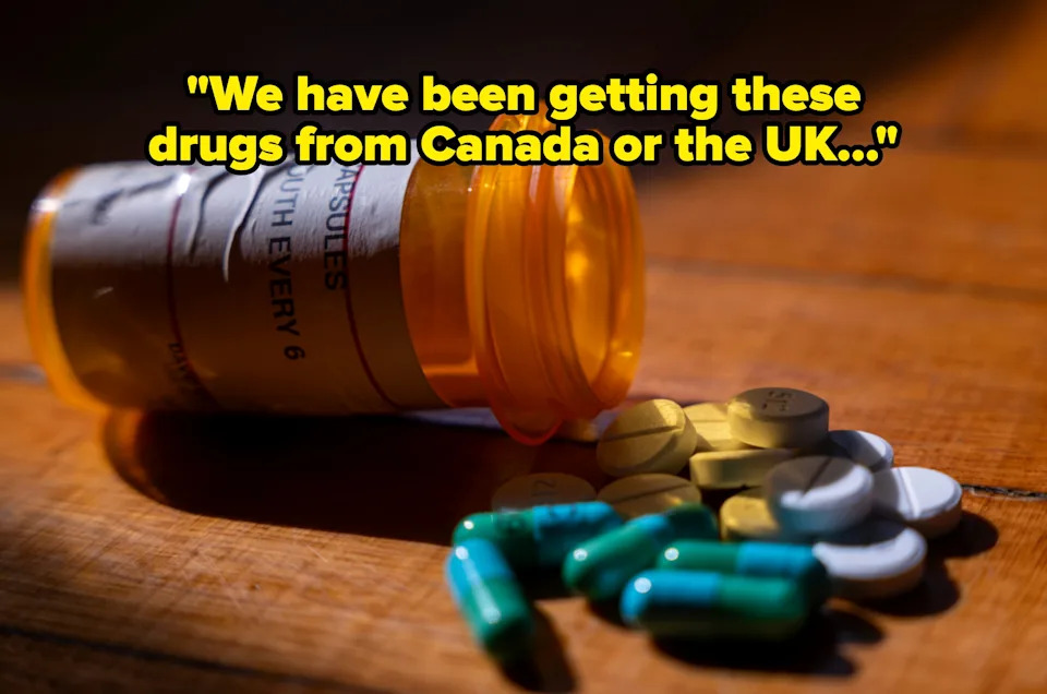 Prescription bottle tipped over with assorted pills on a wooden surface, suggesting medication-related financial considerations