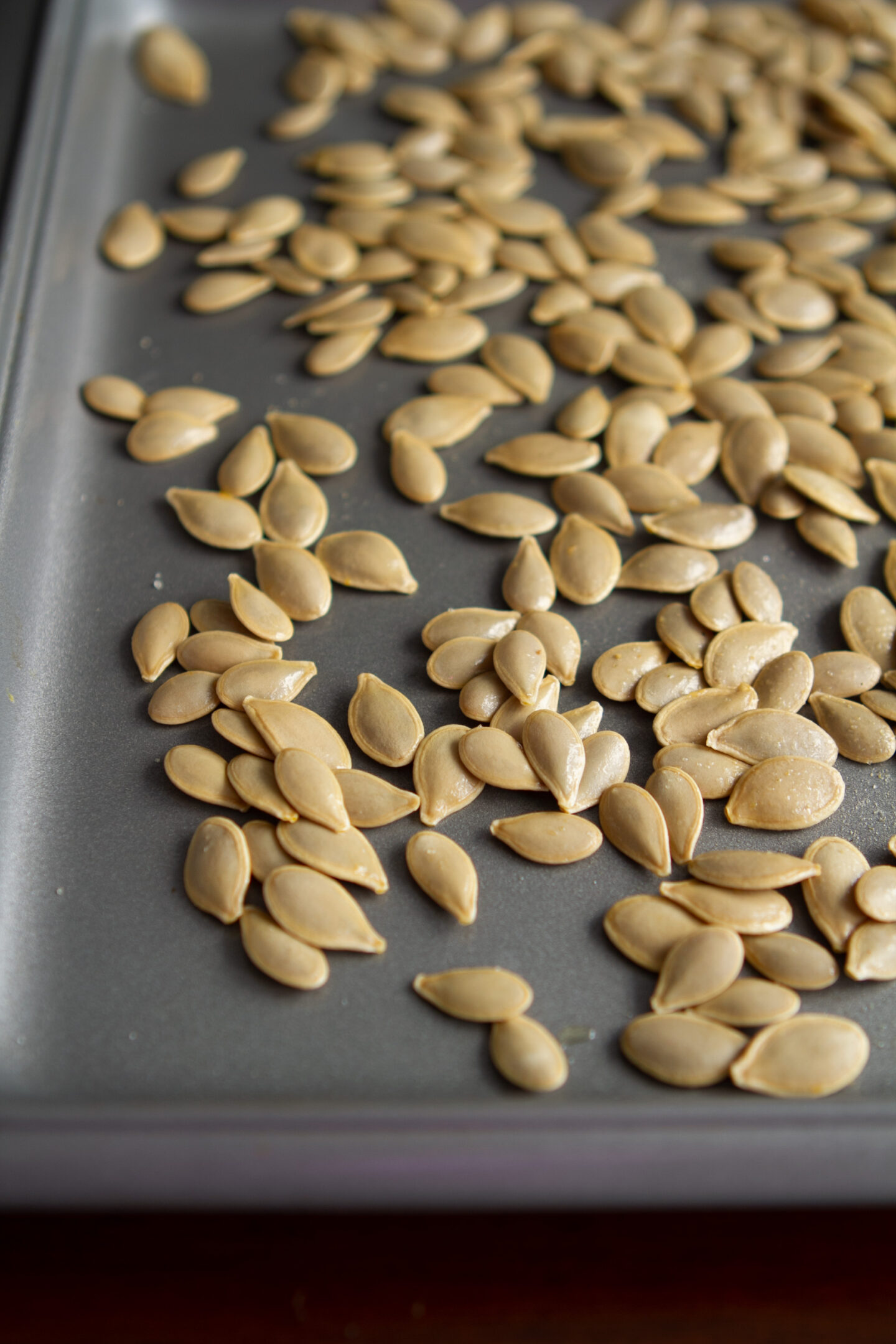 Pumpkin Seeds on Baking Sheet
