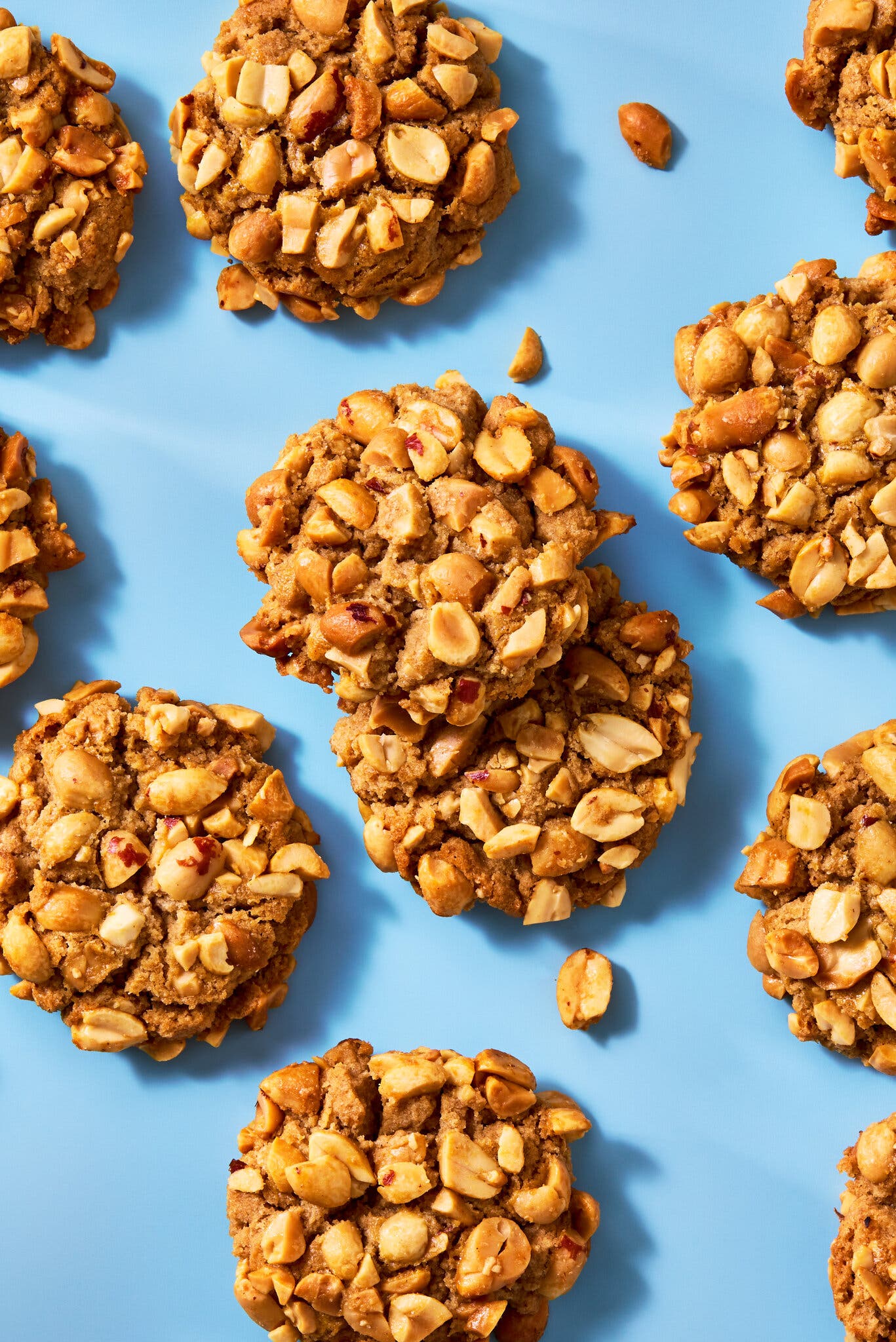 An overhead image of a number of peanutty cookies.